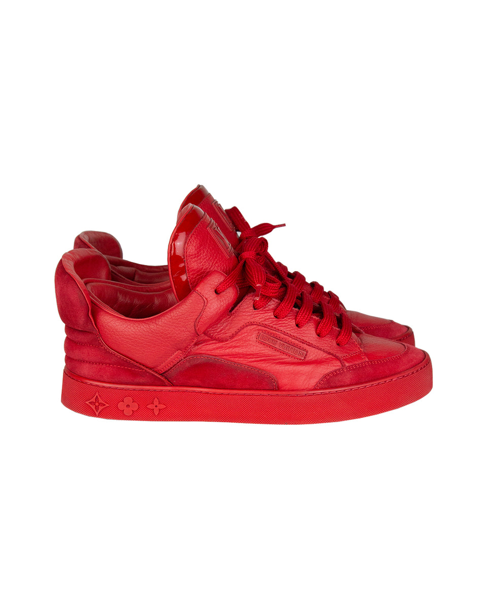 Pochette - Detail shot of Wests red Louis Vuitton Don sneakers